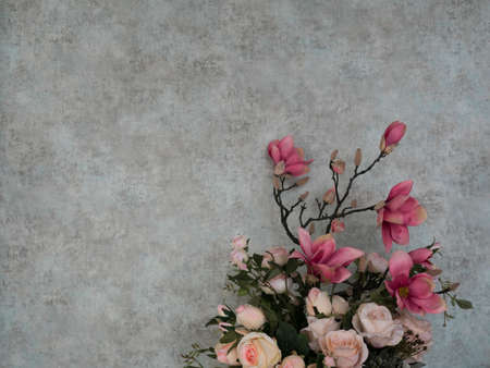 Bouquet of roses with grunge wallpaper for backgroundの写真素材