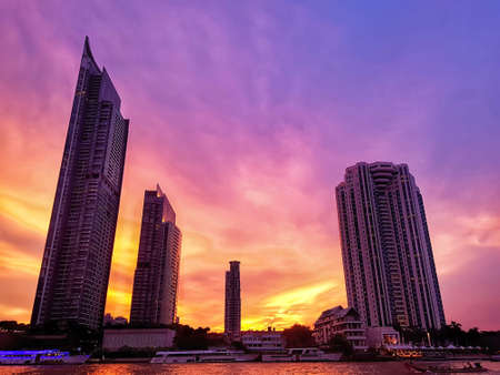 beautiful Bangkok city view with high building at riverside at the dusk with colorful of twilight sky in the evening after sunset timeの写真素材