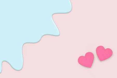 creative pastel of Valentine's day greeting card. two pink heart isolate on pastel light pink background with  blue liquid melt layerの写真素材