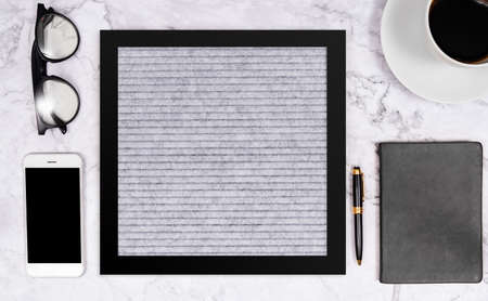 free word on blank letter board in grey color on white marble desk background with coffee cup ,...