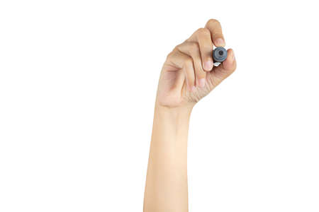 hand holding magic marker pen ready to writing something isolated on white background with copy space, studio shot, front viewの写真素材