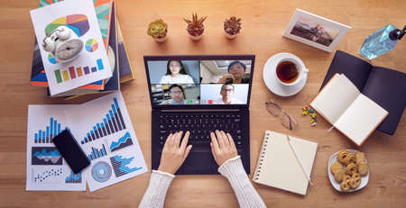 work from home. people make video conference with multi colleague via laptop computer during self...