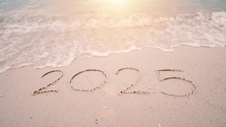 happy new year 2025. number 2024 write on sandy beach, ocean wave splash change to 2025. countdown for happy new year turning from year 2024 to 2025の写真素材