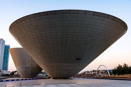 INCHEON, REPUBLIC OF KOREA - FEBURARY 10, 2016: The tri-bowl building in Songdo Central park the financial district of Incheon during sunset.のeditorial素材