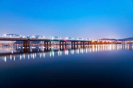 Dongjak bridge over the Han river at night in Seoulの写真素材