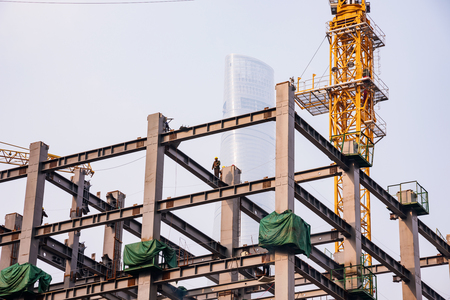 Shanghai, China, March 14, 2016: Construction site in downtown Shanghai with Shanghai tower in the backgroundのeditorial素材