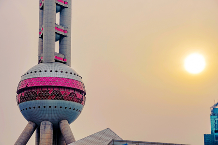 SHANGHAI - MARCH 20: Close up detail photograph of the Oriental Pearl Tower with the sunset in the background on March 20, 2016, in Shanghai.のeditorial素材