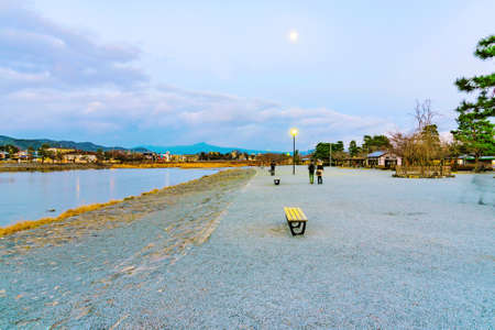 Arashiyama riverside tourist area at night time in Kyotoの写真素材