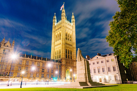 Houses of Parliament at night with statue in foregroundのeditorial素材