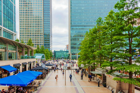 LONDON - AUGUST, 2016: This is Reuters Plaza in Canary Wharf financial district. The plaza has many shops and restaurants nearby and is situated outside Canary Wharf station on August 11th, 2016 in London.のeditorial素材