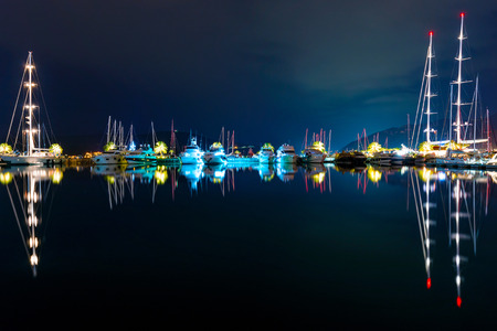 Boats in the Harbor of Tivat at nightの写真素材