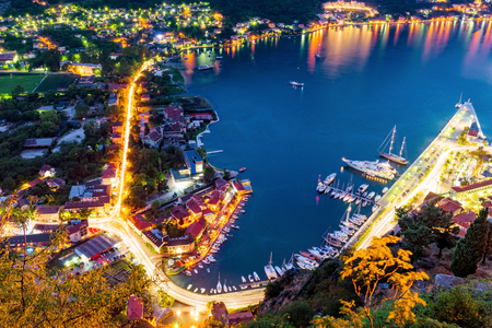 Night view of Kotor bay docks and boatsの写真素材