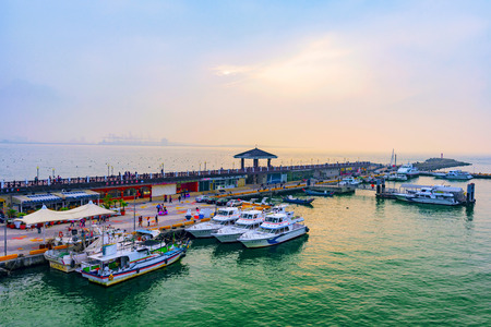 TAIPEI, TAIWAN - JANUARY 05: View of Fisherman's wharf waterfront area a popular travel destination on a misty day during sunset  on January 05, 2017 in Taipeiのeditorial素材