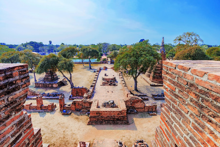 Ancient temple walls and ruins in Thailandの写真素材