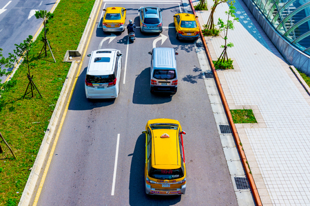 TAIPEI, TAIWAN - MARCH 28: This is an aerial view of road with taxis waiting at traffic lights in...