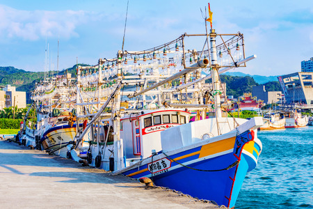 KEELUNG, TAIWAN - APRIL 04: View of large fishing boats in Badouzi fishing village in the countryside of Keelung on April 04, 2017 in Keelungのeditorial素材