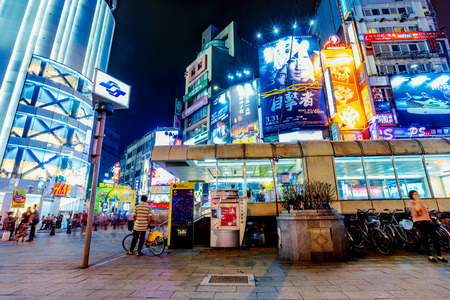 TAIPEI, TAIWAN - APRIL 18: This is Ximen shopping district and Ximen MRT station it is a very popular shopping area in Taipei at night on April 18, 2017 in Taipeiのeditorial素材