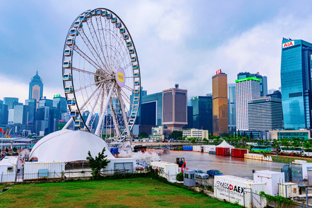 HONG KONG, CHINA - APRIL 25: This is the Hong Kong Observation Wheel with the Central financial district architecture in the background on April 25, 2017 in Hong Kongのeditorial素材