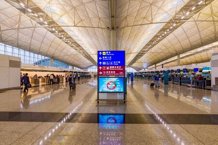 HONG KONG, CHINA - APRIL 27: This is the entrance and check-in desk area for Hong Kong international airport on April 27, 2017 in Hong Kongのeditorial素材