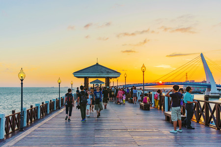 TAIPEI, TAIWAN - MAY 29: This is a view of a pier where people come to watch the sunset in the Fisherman's wharf area of Tamsui May 29, 2017 in Taipeiのeditorial素材