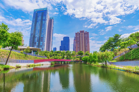 TAICHUNG, TAIWAN - JULY 18: This is a view of skyscrapers and modern architecture in Maple Garden a popular park in the downtown financial district area on July 18, 2017 in Taichungのeditorial素材