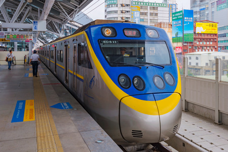 TAICHUNG, TAIWAN - JULY 19: This is a typical Taiwanese train stopped at Taichung main station...
