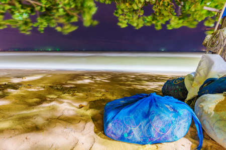 Pattaya beach night view with fishing netsの写真素材