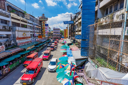CHIANG MAI, THAILAND - JULY 27: This is a view of a busy city street which has a market and traffic in the downtown area on July 27, 2017 in Chiang Maiのeditorial素材