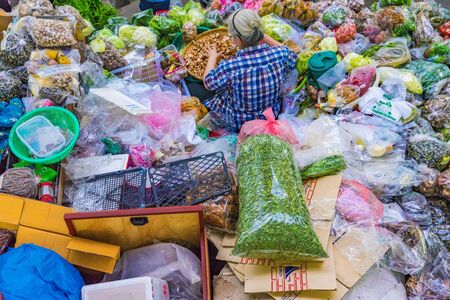 CHIANG MAI, THAILAND - JULY 29: This is a fruit and vegetable stand in Warorot market where locals come to buy goods on July 29, 2017 in Chiang Maiのeditorial素材