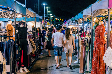 BANGKOK, THAILAND - AUGUST 15: Clothing stalls selling cheap clothes in the famous Huamum night market which is very popular amongst local people on August 15, 2017 in Bangkokのeditorial素材