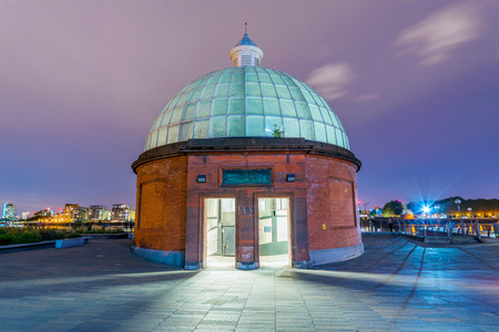 Greenwich Foot Tunnel entrance at night in Londonの写真素材