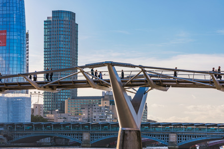 LONDON, UNITED KINGDOM - NOVEMBER 06: View of the Millenium bridge and modern London skyscrapers on...