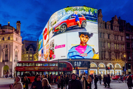 LONDON, UNITED KINGDOM - MARCH 26: This is an evening view of Piccadilly Circus, a famous shopping and travel destination in central London on March 26, 2018 in Londonのeditorial素材
