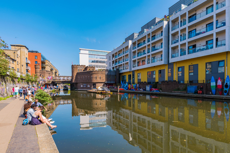 LONDON, UNITED KINGDOM - MAY 05: Regent's Canal riverside walkway and architecture in Camden on May 05, 2018 in Londonのeditorial素材