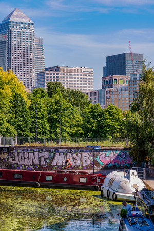 LONDON, UNITED KINGDOM - JUNE 06: View of Canary Wharf financial district architecture taken from Limehouse Cut on June 06, 2018 in Londonのeditorial素材
