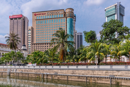 KUALA LUMPUR, MALAYSIA - JULY 22: View of city buildings along the River of Life in the downtown area on July 22, 2018 in Kuala Lumpurのeditorial素材