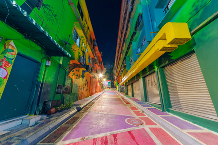KUALA LUMPUR, MALAYSIA - JULY 23: Alley with Colorful street art on the Lost Stream of Jalan Alor at night on July 23, 2018 in Kuala Lumpurのeditorial素材