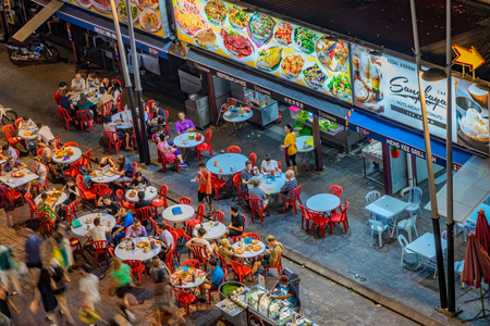 KUALA LUMPUR, MALAYSIA - JULY 24: Aerial view of Jalan Alor food street vendors, a famous food street where many tourists come to eat at night on July 24, 2018 in Kuala Lumpurのeditorial素材