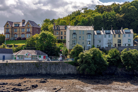 BANGOR, UNITED KINGDOM - September 05: View of riverside buildings along the Menai Strait near Garth Pier in Bangor on September 05, 2018 in Bangorのeditorial素材