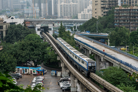 CHONGQING, CHINA - SEPTEMBER 18: View of a Chongqing Rail Transit train going arriving at Niujiaotou station  on September 18, 2018 in Chongqingのeditorial素材