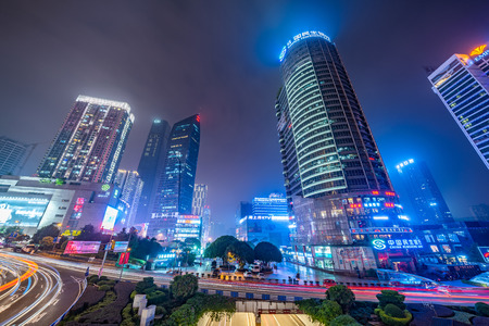 CHONGQING, CHINA - SEPTEMBER 18: Modern city buildings at night in the famous Guanyinqiao shopping district in September 18, 2018 in Chognqingのeditorial素材