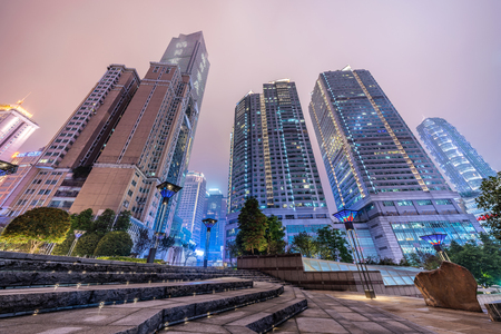 CHONGQING, CHINA - SEPTEMBER 18: Night view of modern city skyscrapers, and shopping malls in the Jiefangbei downtown area on September 18, 2018 in Chongqingのeditorial素材