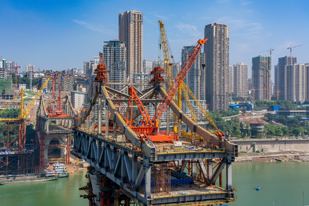 CHONGQING, CHINA - SEPTEMBER 19: View of a bridge under constuction along the Yangtze river in Chongqing on September 19, 2018 in Chognqingのeditorial素材