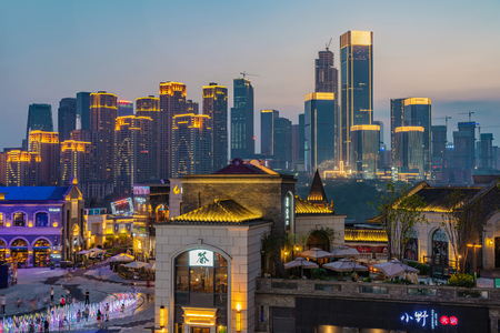 CHONGQING, CHINA - SEPTEMBER 23: Danzishi old street architecture, a famous old street and popular tourist destination with the Chongqing city skyline in the background on September 23, 2018 in Chongqingのeditorial素材