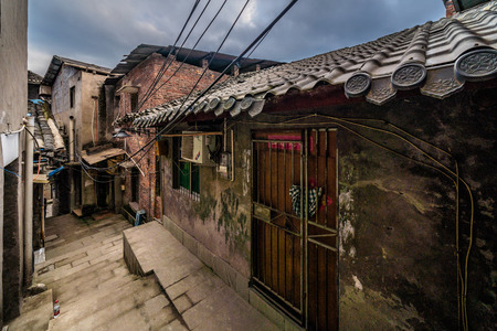 CHONGQING, CHINA - SEPTEMBER 20: Traditional Chinese houses in a small street at Ciqikou ancient town in September 20, 2018 in Chongqingのeditorial素材
