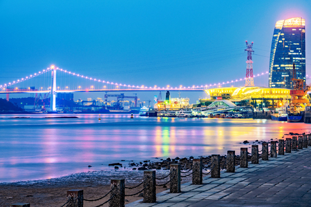 XIAMEN, CHINA -OCTOBER 08: This is a view of the famous Haicang Bridge from Xiamen Bay Park at night on October 08, 2018 in Xiamenのeditorial素材