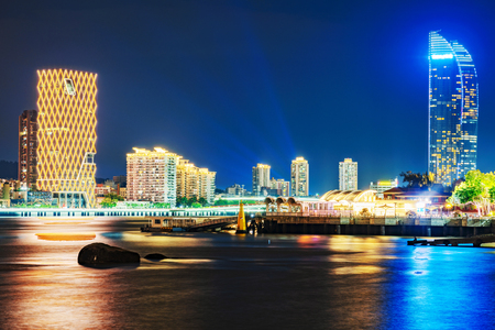 XIAMEN, CHINA -OCTOBER 11: This is a night view of city skyline buildings and the Shimao Straits Tower along the waterfront area on October 11, 2018 in Xiamenのeditorial素材