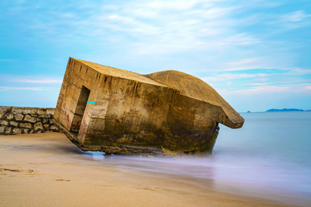 Old bunker on a quiet beach in Xiamen, Chinaの写真素材