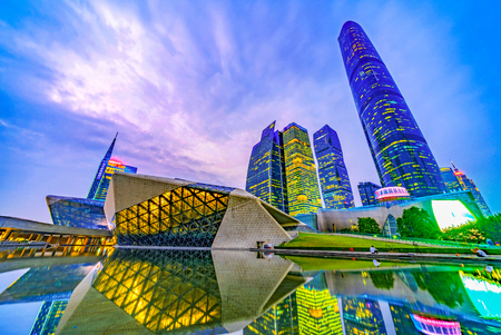 GUANGZHOU, CHINA - OCTOBER 23: Evening view of the Guangzhou Opera House and high rise city buildings in the downtown area on October 23, 2018 in Guangzhouのeditorial素材