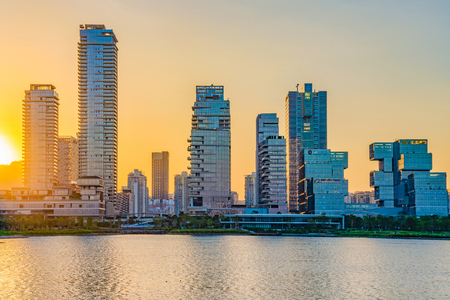 SHENZHEN, CHINA - OCTOBER 30: View of modern city buildings during sunset at Shenzhen Talent Park in the financial district on October 30, 2018 in Shenzhenのeditorial素材